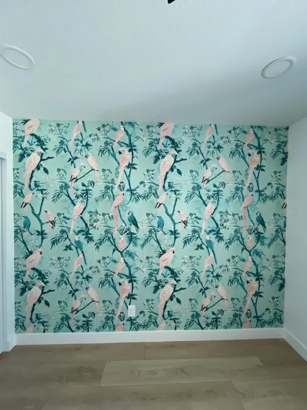 Professional wallpaper installer at work in Los Angeles